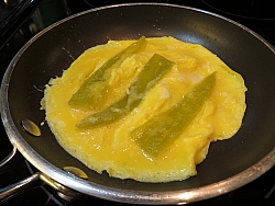 Frying omelet